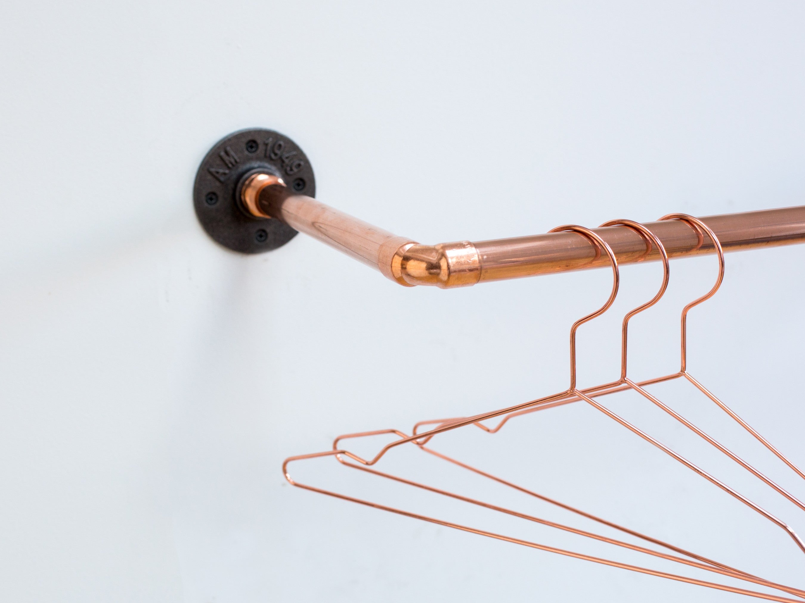 Wall mounted clothing rack Industrial copper pipe and iron fittings The Copper Works Design